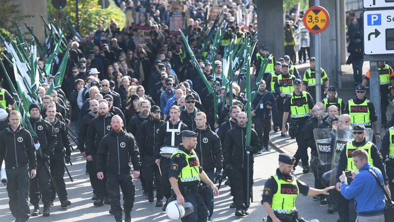 Nordic Resistance Movement  marchers in central Gothenburg, Sweden, September 30th, 2017. Photograph: Fredrik Sandberg/TT News Agency/Reuters