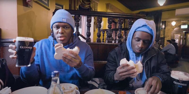 Influencers: Sidemen KSI and Tobi Brown with their crisp sandwiches and pints of guinness at Doyles pub in Dublin