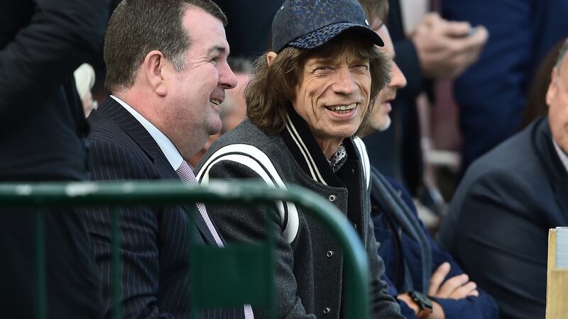Mick Jagger watches  play during the third day of the test cricket match between Ireland and Pakistan on Sunday in Malahide. Photograph: Charles McQuillan/Getty Images