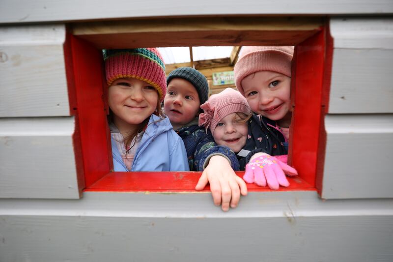 Isabelle Daly, Finn Osborne, Millie McGrath and Willow McCoy at the Curious by Nature outdoor preschool, Co Wicklow. Photograph: Nick Bradshaw 
