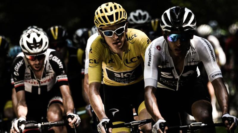Geraint Thomas, wearing the overall leader’s yellow jersey, rides during the 16th stage. Photograph: Getty Images