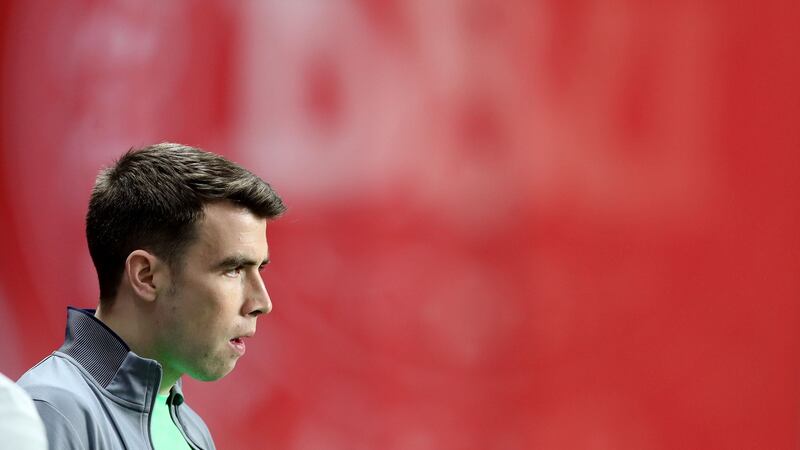 Seamus Coleman watches training. Photograph: Ryan Byrne/Inpho