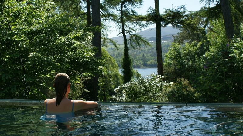 Take a long, soothing soak in the outdoor, heated infinity pool overlooking the bay in the Park Hotel, Kenmare.