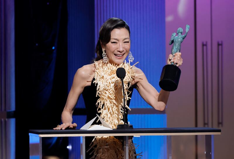 Michelle Yeoh accepts the Outstanding Performance by a Female Actor in a Leading Role for Everything Everywhere All at Once. Photograph: Kevin Winter/Getty Images