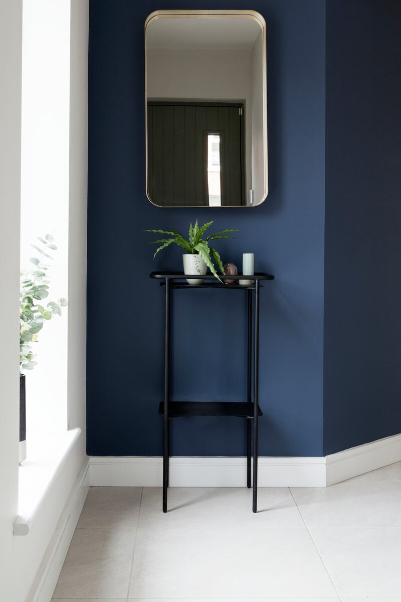 Entrance hall in dark navy by Optimise Design