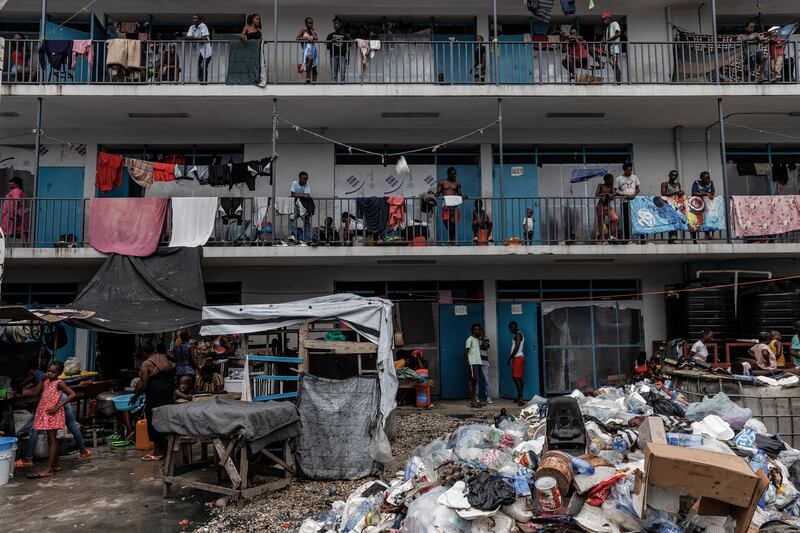 People at Lycée Marie Jeanne, a school in the Lavaud neighborhood of Port-au-Prince, Haiti, that was turned into a camp for people escaping violence, last September. Photograph: Adriana Zehbrauskas/The New York Times
                      
