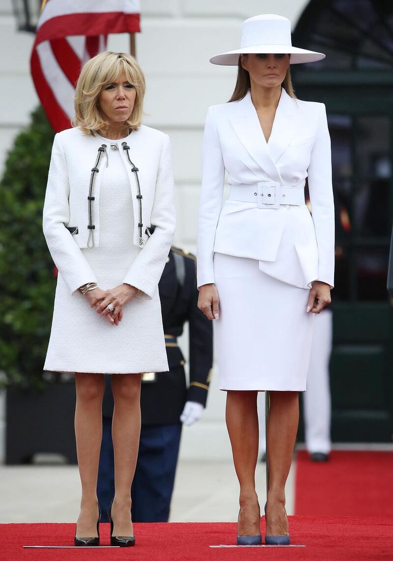 US first lady Melania stands with French first lady Brigitte Macron, during an arrival ceremony at the White House. Photograph: Mark Wilson/Getty Images.