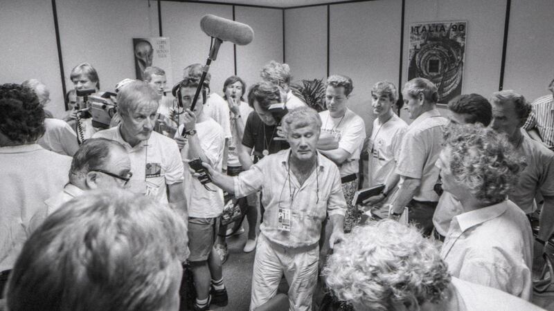 Eamon Dunphy (right) speaks to the media after manager Jack Charlton had left the press conference. Photo: Billy Stickland/Inpho