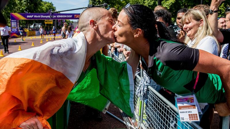 Rob Heffernan with his wife Marian after his eighth place finish in London. Photograph: Morgan Treacy/Inpho