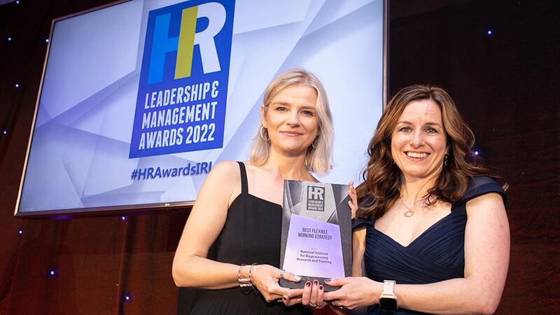 Karina Browne, awards judge, presents the Best Flexible Working Strategy award to Gemma Grimes, National Institute for Bioprocessing Research and Training.