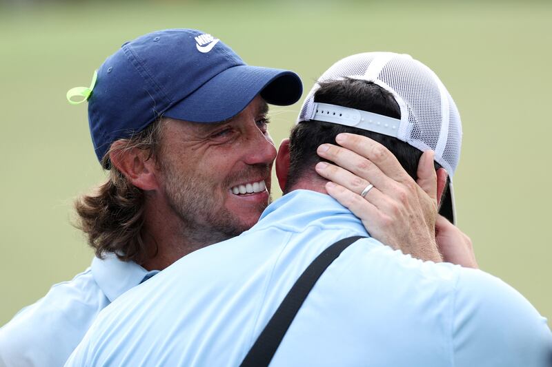 Tommy Fleetwood of England and his stepson, Oscar Craig, embrace on the 18th green after the Tour Championship. Photograph: Kevin C Cox/Getty