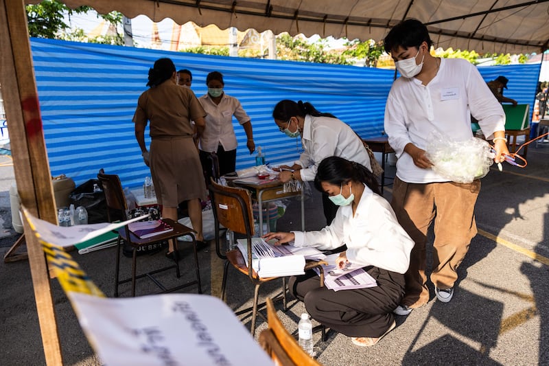 Polling staff disassemble a polling station at 5pm at the end of election day on May 14th in Bangkok, Thailand. Photograph: Lauren DeCicca/Getty