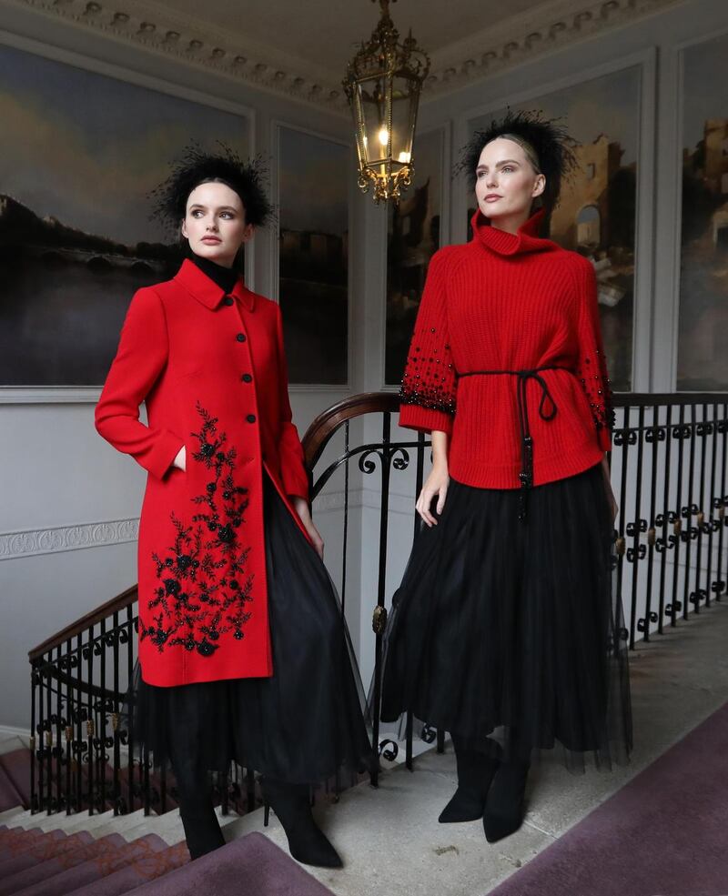 Joelle embellished red coat  and black tulle skirt  and (right) red embellished cashmere sweater  Photograph: Louise Kennedy