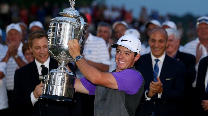 Rory McIlroy holds aloft the US PGA after winning at Valhalla in 2014. Photo: Getty Images