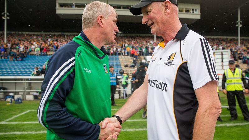 Limerick manager John Kiely shakes hands with Kilkenny manager Brian Cody after the game. Photograph: Oisin Keniry/Inpho