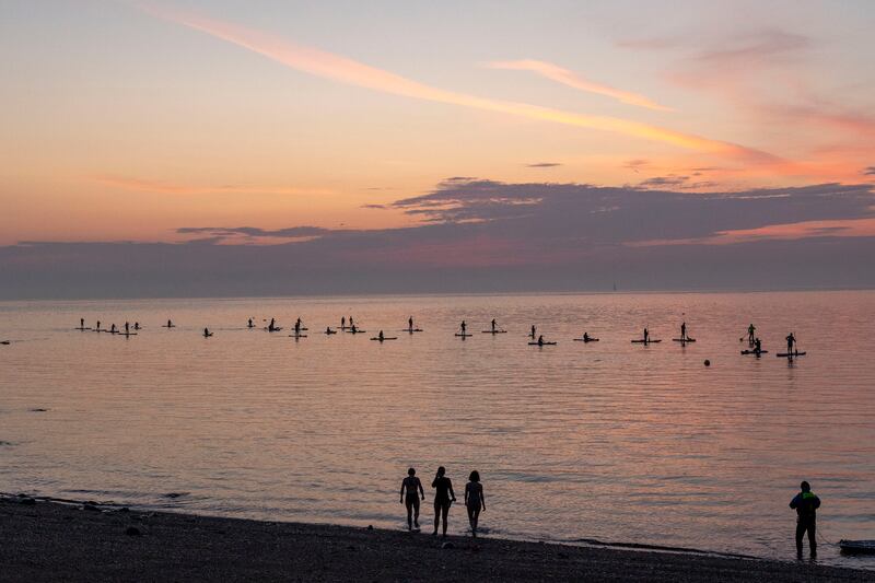 Paddle boarders at Darkness into Light 2024 in Howth, Dublin. Photograph: Tom Honan