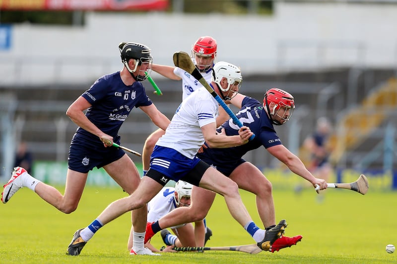 Denis Maher of Thurles Sarsfields and Kildangan’s Bryan McLoughney. Photograph: Ken Sutton/Inpho