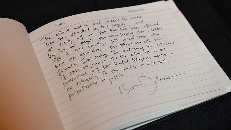 The message left by British prime minister Boris Johnson is seen in the book of condolence during a visit to Thurrock Council Offices. Photograph: Getty