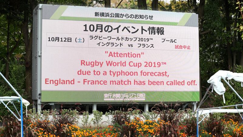 A sign outside of the Yokohama Stadium informs of the cancellation of the England v France game due to Typhoon Hagibis forecast for Saturday. Photograph: Stu Forster/Getty Images