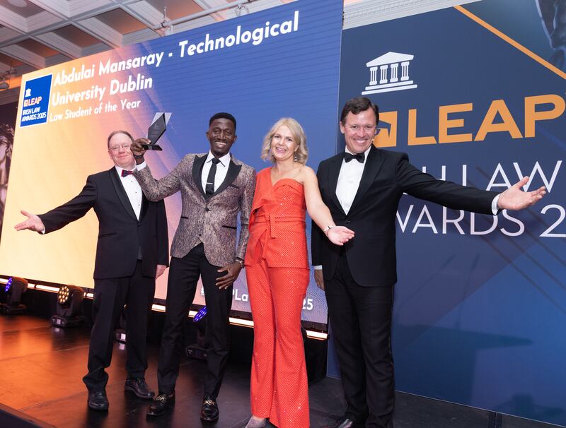 Richard Hammond, solicitor and partner at Hammond Good LLP and chair of the judging panel of the Leap Irish Law Awards; Abdulai Mansaray, law graduate; Aisling Meehan, solicitor and principal at Aisling Meehan Agricultural Solicitors; and Anton Savage, MC of the night. Photograph: Paul Sherwood
