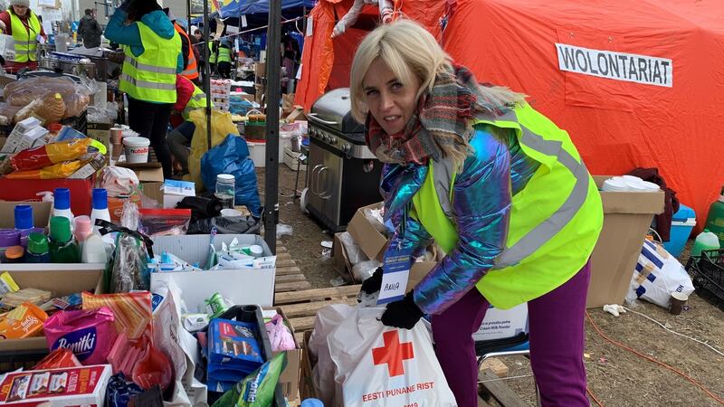Polish fitness trainer Ania Lapinska has four children. “Seeing all those Ukrainian mothers and children arriving lost at the border broke my heart,” she says. “I had to do something.” Lapinska is one of 300 Polish volunteers working round the clock at the reception centre nearest the border. Photograph: Lara Marlowe