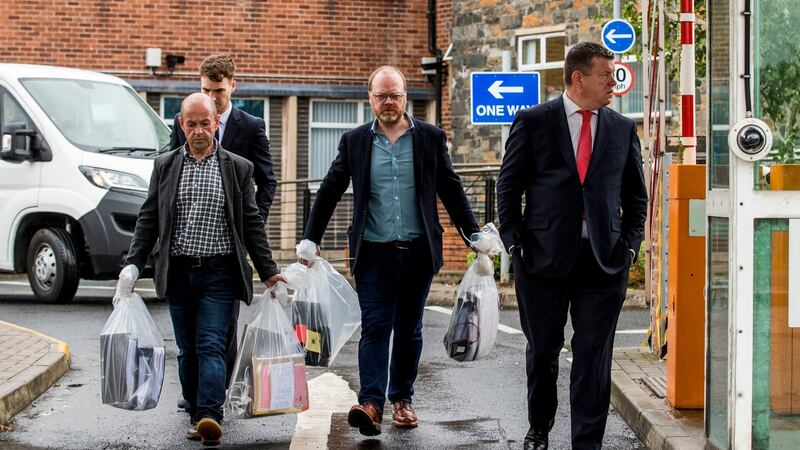 June 4th last: Journalists Barry McCaffrey and Trevor Birney carry returned documents in Belfast after a haul of material was unlawfully seized by police following the making of No Stone Unturned. The journalists had earlier won a judicial review challenge against the warrants police used to raid their homes and offices in 2018. Photograph: Liam McBurney/PA Wire