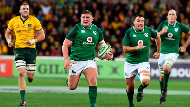 Ireland’s Tadhg Furlong makes a break   supported by teammates Niall Scannell ) and Devin Toner  as Australian Wallabies defender Izack Rodda looks on. Photograph: William West/AFP/Getty