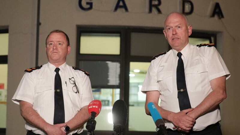 Supt Peter Burke and Chief Supt Finbarr Murphy speaking to the media outside Blanchardstown Garda station  last night. Photograph: Collins