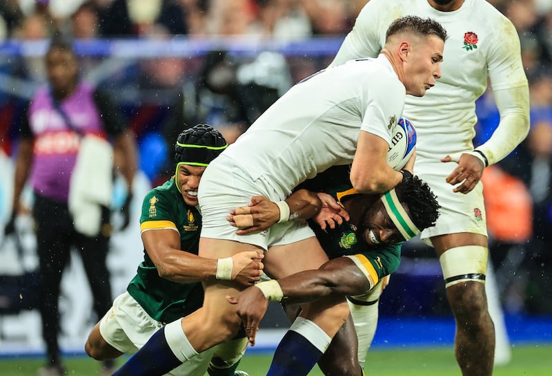 South Africa’s Kurt-Lee Arendse and Siya Kolisi tackle Freddie Steward of England. Photograph: Billy Stickland/Inpho 