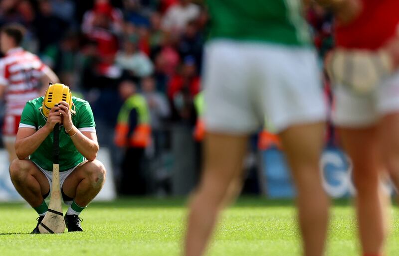  Limerick’s Cathal O’Neill dejected after Cork ended their bid for five All-Irelands in a row. Photograph: James Crombie/Inpho