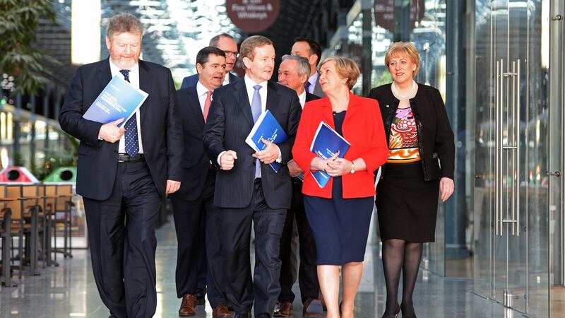 Simon Coveney with fellow Fine Gael ministers James Reilly, Paschal Donohoe, taoiseach Enda Kenny, Richard Bruton, Leo Varadkar, Frances Fitzgerald and Heather Humphreys. Photograph: Eric Luke