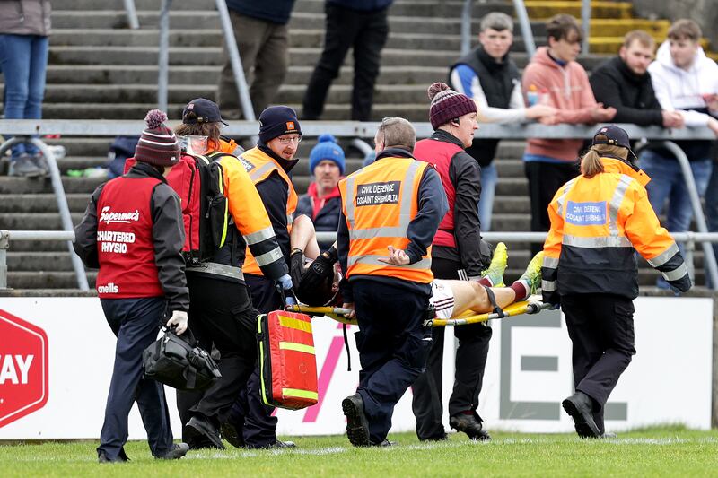 Galway’s Damien Comer is carried off the pitch with an injury suffered in his team's defeat by Roscommon. Photograph: Laszlo Geczo/Inpho