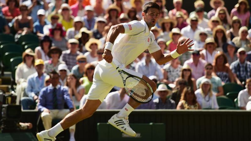 Novak Djokovic chases down the ball during his semi-final clash against Richard Gasquet at Wimbledon. Photograph:   Shaun Botterill/Getty Images
