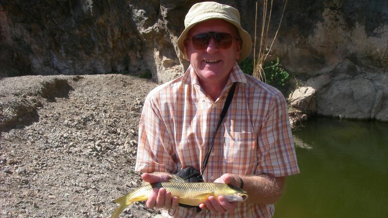 A Klinkhammer dry fly enticed this barbel of 0.6kg from a deep pool in an otherwise dry River Rio, in the town of Casasola in Spain