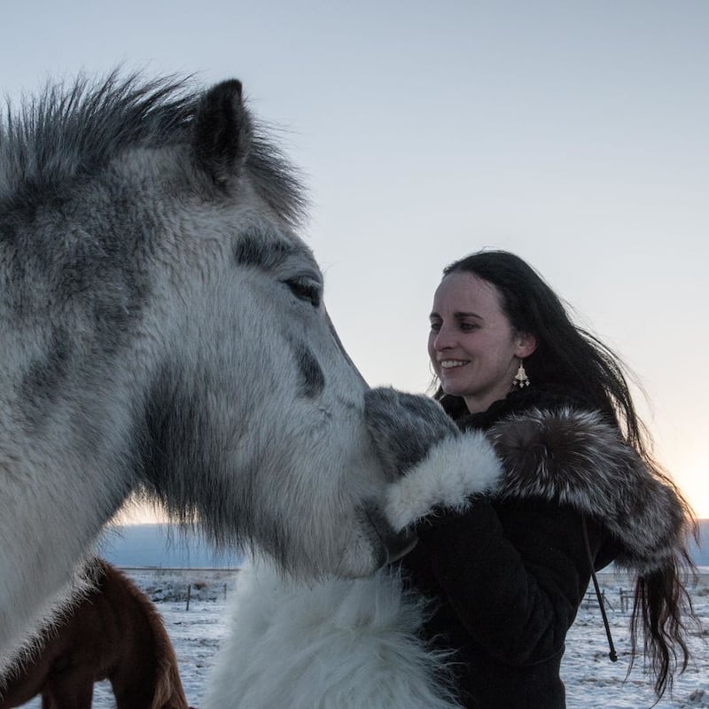 Sibeal Turraoin with Icelandic horses in Iceland, where she has been living for 18 months
