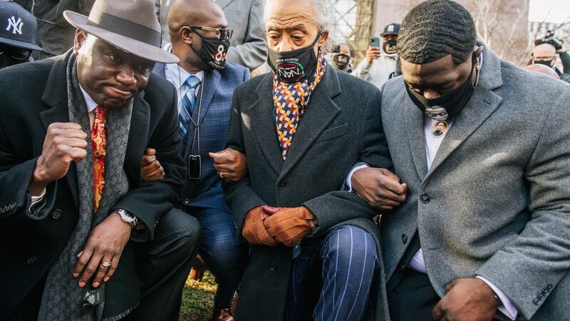 Attorney Ben Crump, Rev Al Sharpton  and  Brandon Williams, the nephew of George Floyd, outside the courtroom in   Minneapolis. Photograph: Brandon Bell/Getty Images