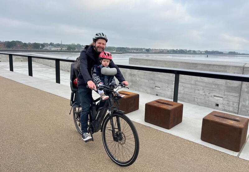 Des Egan and his daughter Seoidín enjoy Dublin Port’s Tolka Estuary Greenway, which is now open to the public along the northern perimeter of the port. Photo: Bryan O’Brien/The Irish Times