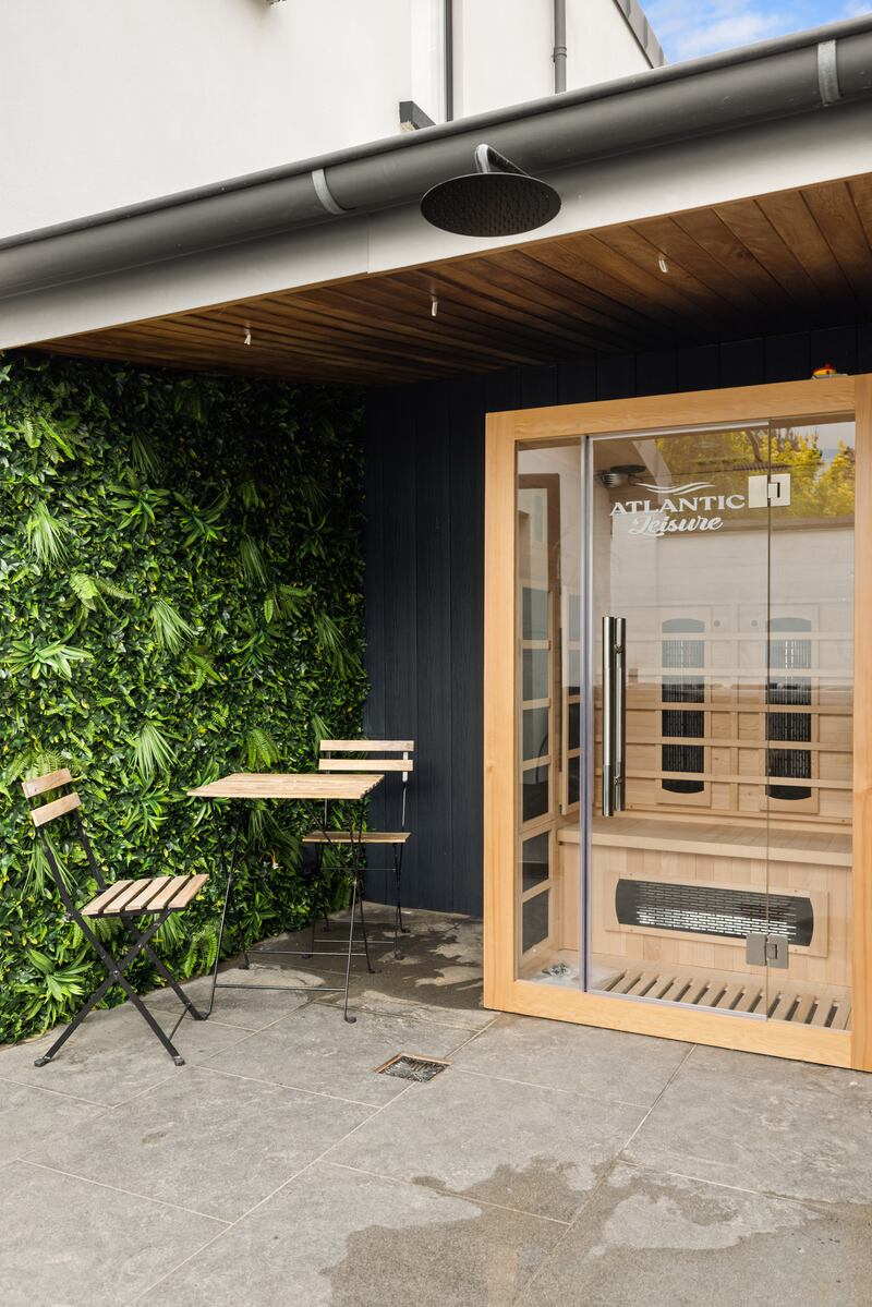 A sauna lies on a terrace off the main bedroom
