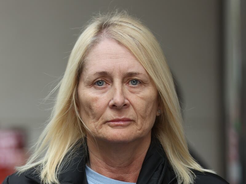 Patricia Burns, whose father Thomas Burns was shot dead by a British soldier in 1972 with Time for Truth and Justice campaigners during a protest against the Northern Ireland Troubles (Legacy and Reconciliation) Bill outside the Northern Ireland Office (NIO) at Erskine House in Belfast. Picture date: Thursday May 11, 2023. PA Photo. See PA story ULSTER Legacy. Photo credit should read: Liam McBurney/PA Wire