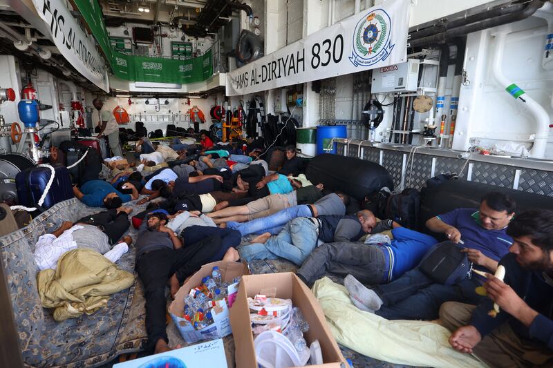 Evacuees rest onboard a Saudi vessel docked off the seaport of Port Sudan. Photograph: Fayez Nureldine/AFP/Getty Images