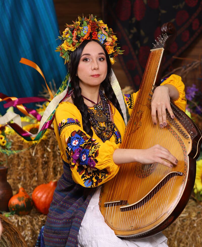 Kseniya Rusnak with her bandura, or Ukrainian harp
