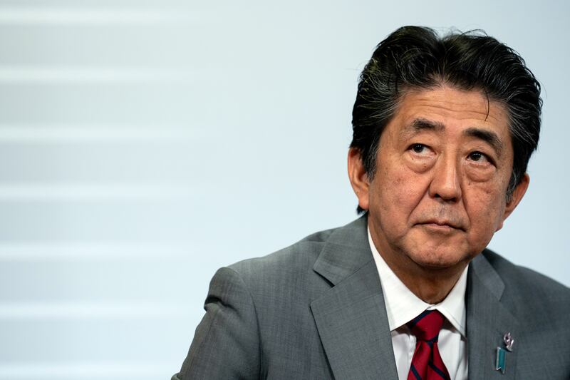 Shinzo Abe overcame multiple scandals to become Japan’s longest serving leader in history, overtaking his uncle, Eisaku Sato. Photograph: Erin Schaff/The New York Times
