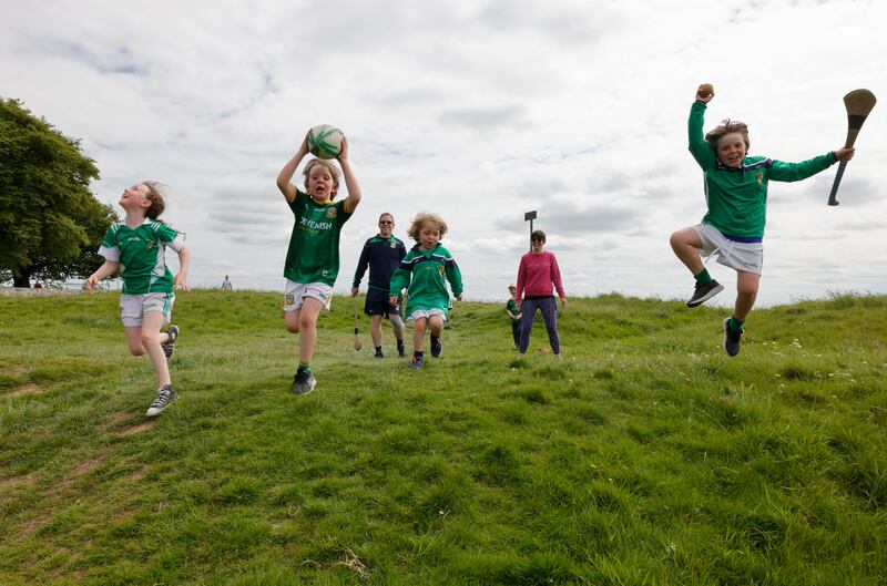 Members of the Tobin and Graham Families Ciara and Sean with kids Alannah, Cian, Joey, Saoirse and Hugh and enjoying the space at the Hill of Tara. Photograph: Alan Betson