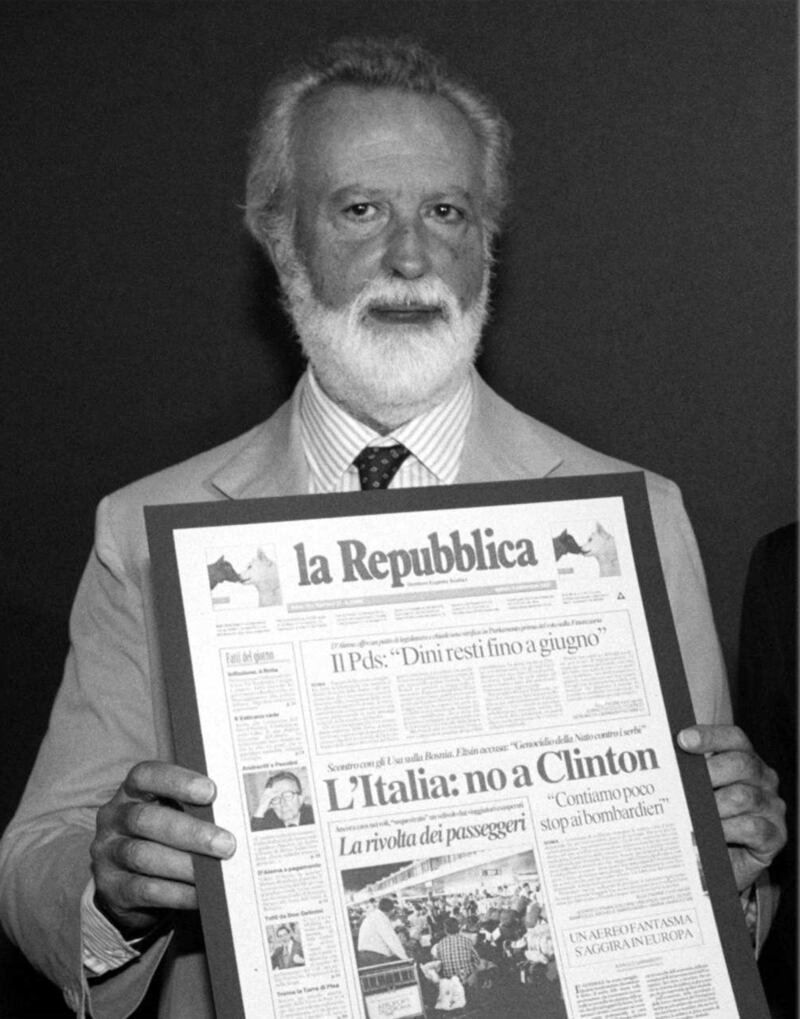 Eugenio Scalfari with an edition of La Repubblica newspaper in Milan in 1992. Photograph: AP