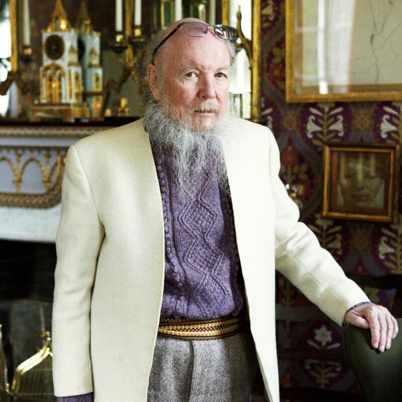 Head of a Boy: Garech Browne in the sittingroom at Luggala with the Lucian Freud portrait of him as a boy, which Browne claimed to be a replica, in the background. Photograph: Neil Gavin