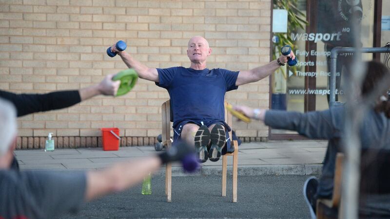 Dr Noel McCaffrey puts the participants of the ExWell Medical training programme through their early morning paces in Clontarf. Photograph: Dara Mac Donaill