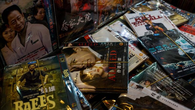 Fake DVDs of American films for sale in Shanghai. China is often portrayed as a land of fake gadgets and pirated software. Photograph: Chandan Khanna/AFP/Getty Images