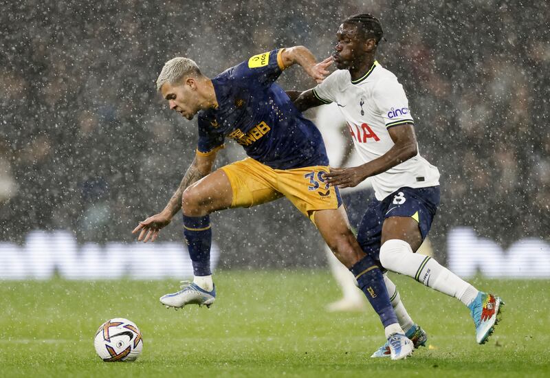 Bruno Guimaraes of Newcastle in action against Yves Bissouma. Photograph: Tolga Akmen/EPA