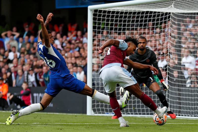 Aston Villa's English striker Ollie Watkins scores the opening goal of the English Premier League football match between Chelsea and Aston Villa. Photograph: Ian Kington/AFP via Getty