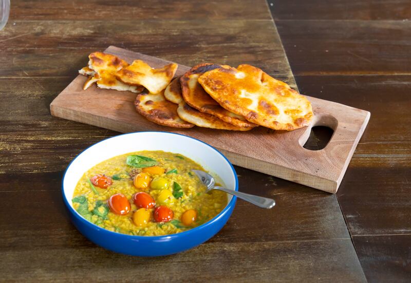 Coconut dal, tempered tomatoes and soft flatbread, by The Tannery chef Paul Flynn. Photograph: Patrick Browne